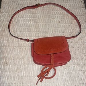 Vince Camuto Convertible leather bag changes from a belt bag to a shoulder bag
